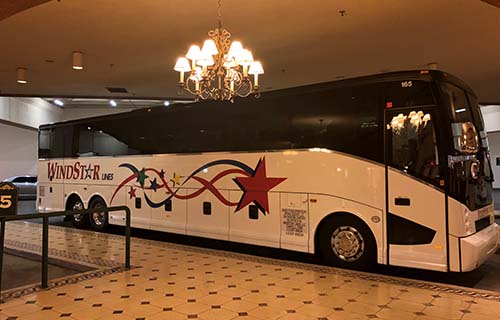 Windstar Charter Bus On Display inside a building