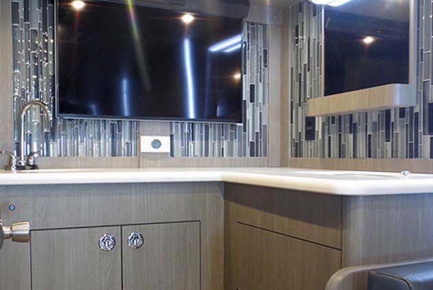 VIP Motorcoach Flat Screen Television with Sink and Countertop
