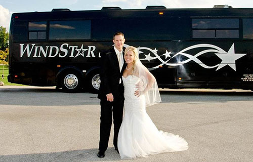 Wedding couple renting Windstar bus